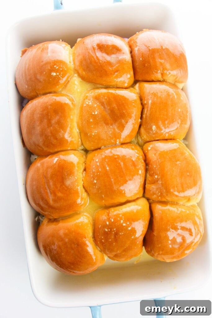 Simple Savory Chicken Sliders 11 Top halves of slider buns placed over the fillings