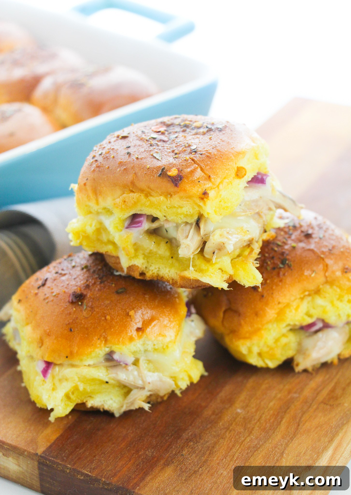 Simple Savory Chicken Sliders 13 Baked Easy Chicken Sliders stacked on top of each other