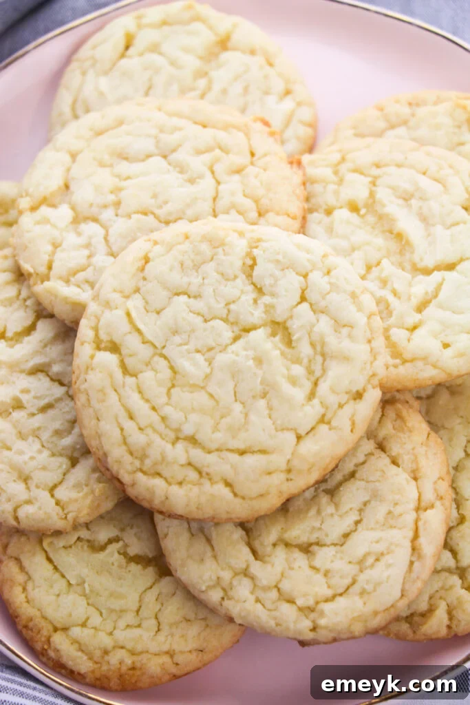 Easy Cake Mix Sugar Cookies on a pink plate, ready to be served