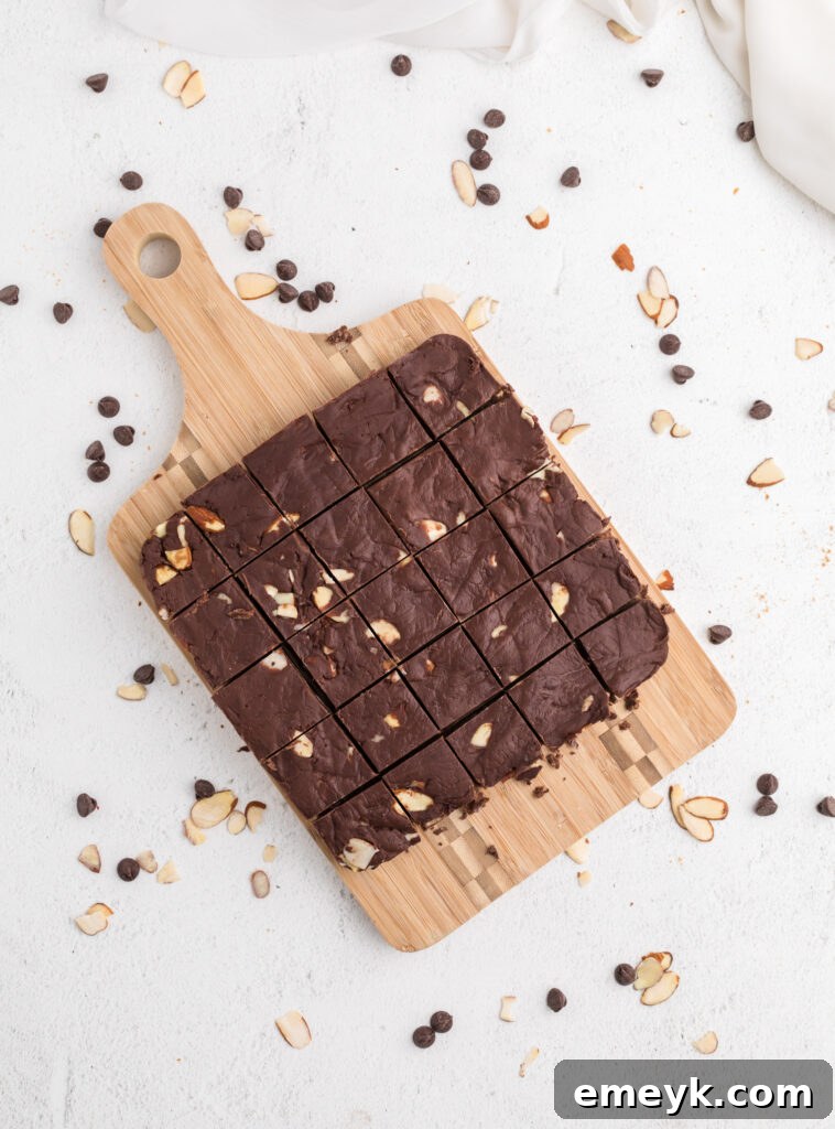 Close-up of perfectly cut and arranged Easy Chocolate Fudge squares, ready to be eaten.