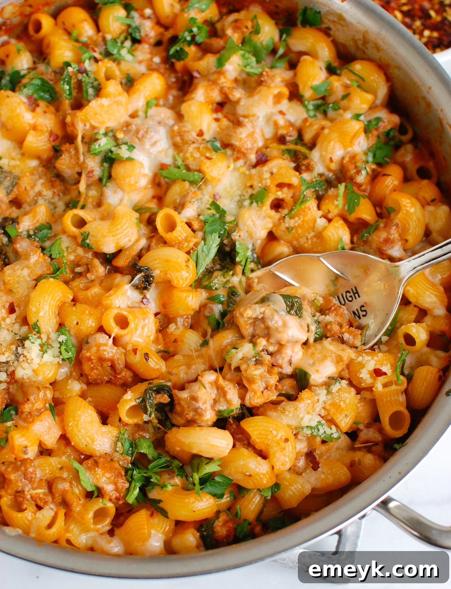 Spicy Sausage Pasta with spoon