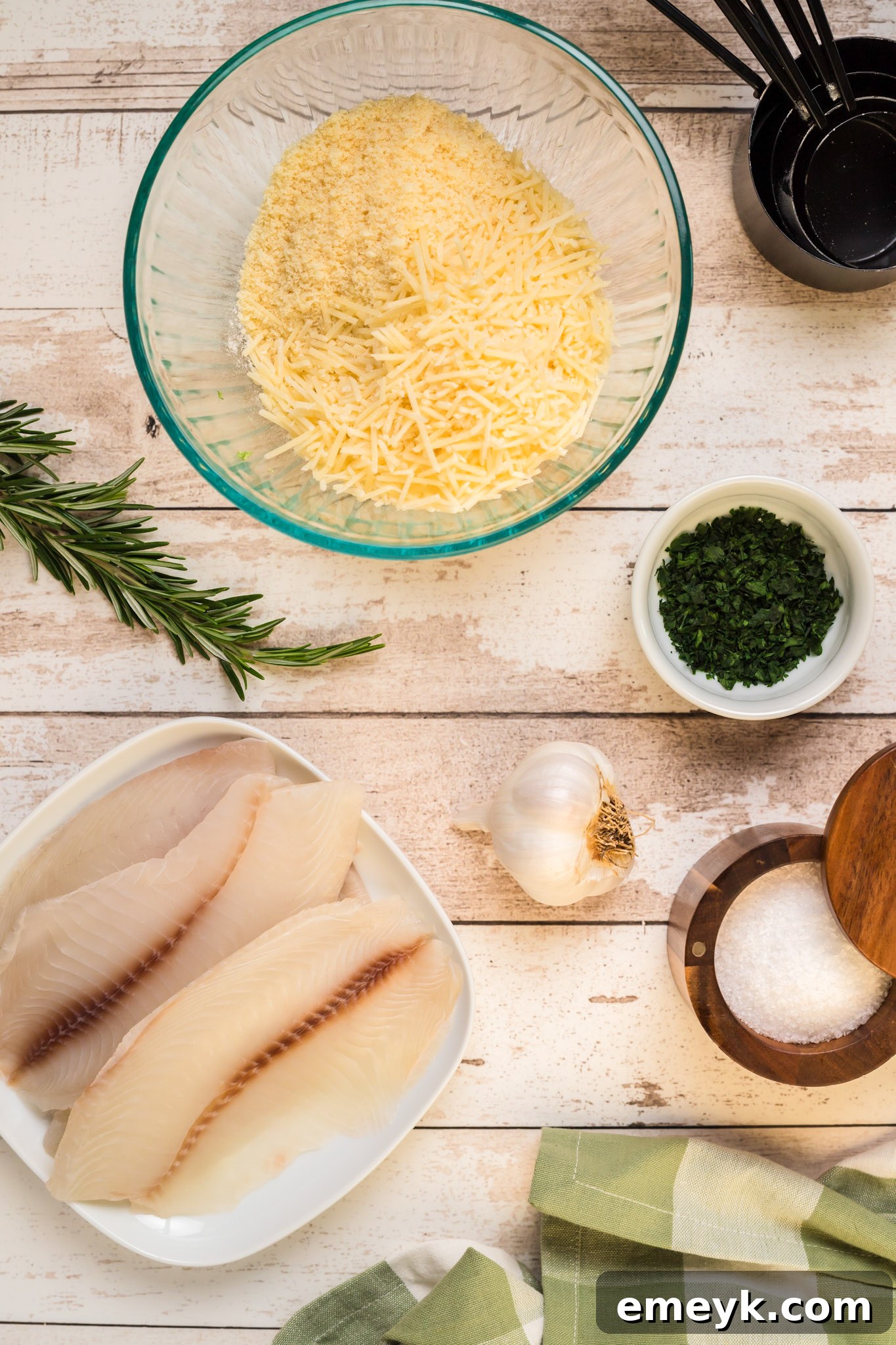 Tilapia fillet coated in flour, a crucial step for the crispy crust.