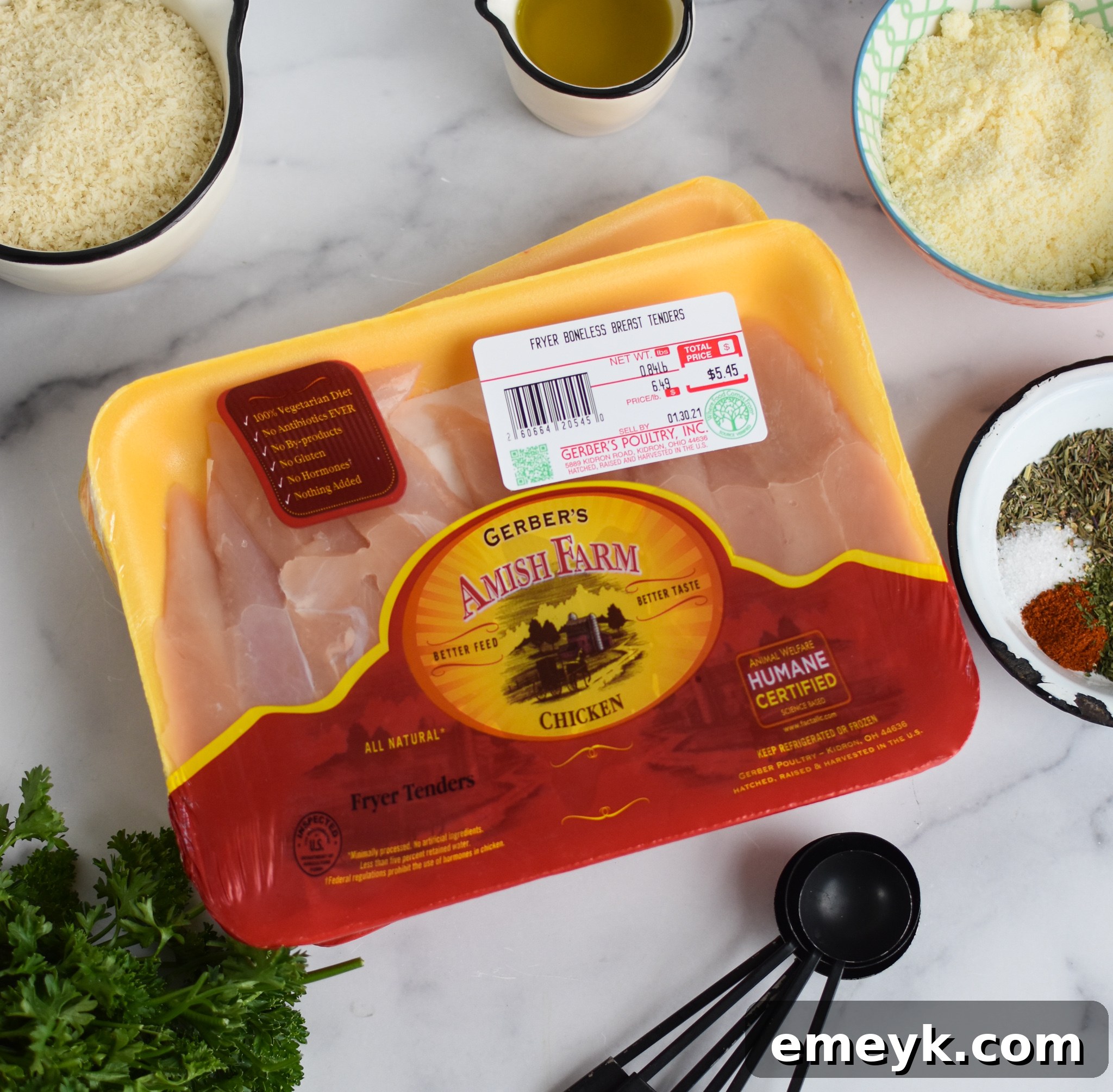 Golden Crispy Air Fryer Chicken Tenders 6 Air Fryer Chicken Tenders ingredients on a white board.