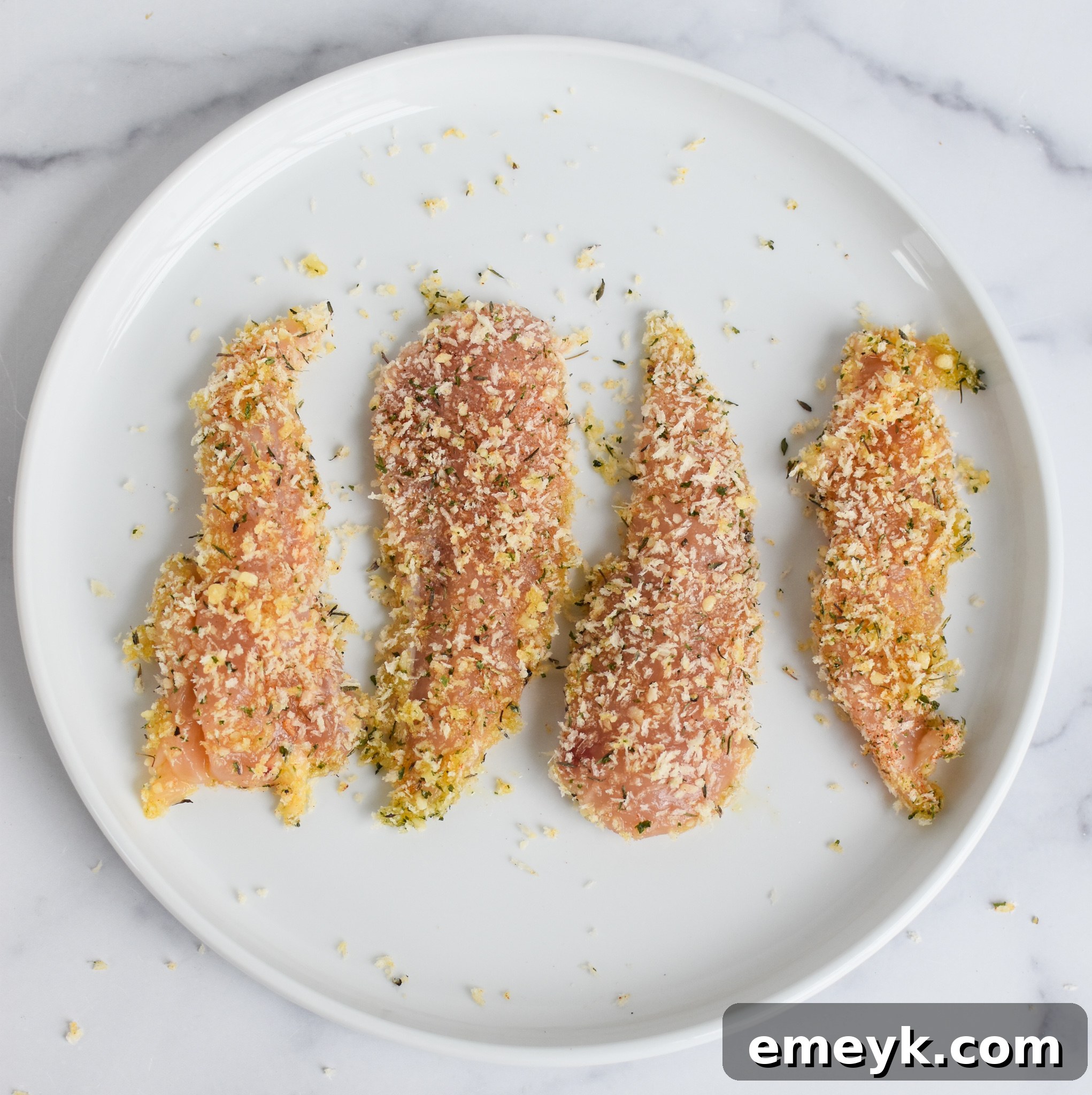 Golden Crispy Air Fryer Chicken Tenders 8 Air Fryer Chicken Tenders chicken tenders coated in panko breadcrumbs.