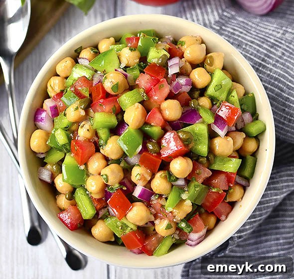 17 Effortless Sides to Elevate Your Fish Meal 12 Simple Italian Chickpea Salad with fresh vegetables.