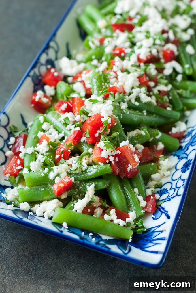 17 Effortless Sides to Elevate Your Fish Meal 14 Fresh Greek Green Bean Salad with red peppers and feta.
