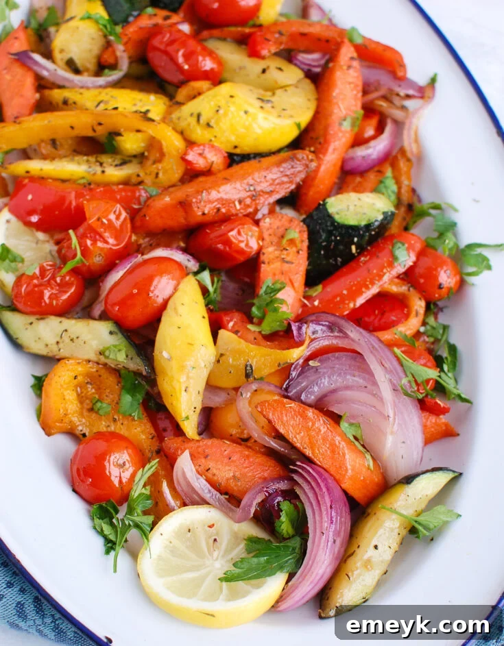 17 Effortless Sides to Elevate Your Fish Meal 3 Colorful Mediterranean Roasted Vegetables seasoned with herbs.