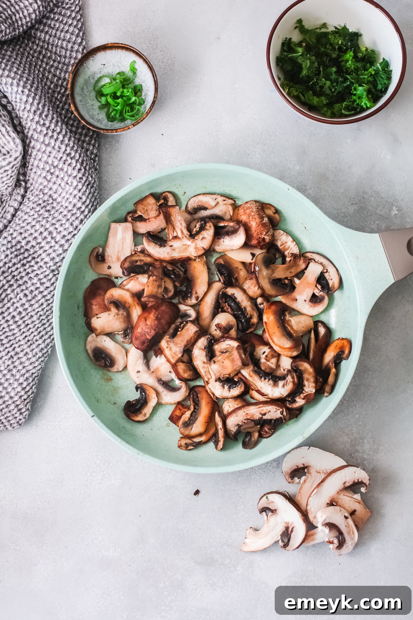 Mushrooms in a skillet after caramelizing, ready for the next ingredients.