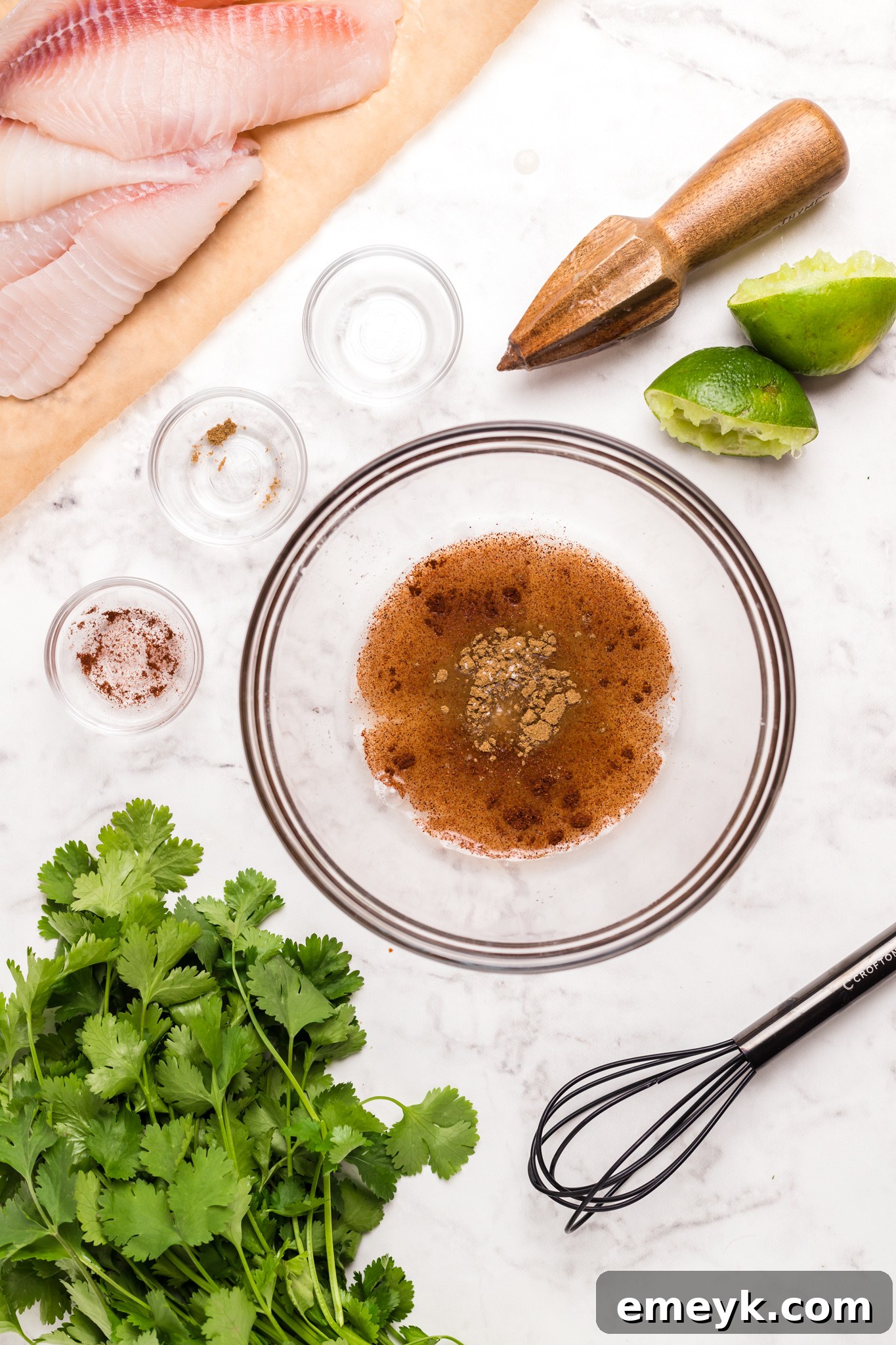 Crispy Air Fryer Tilapia 4 Preparing the zesty lime marinade for tilapia.