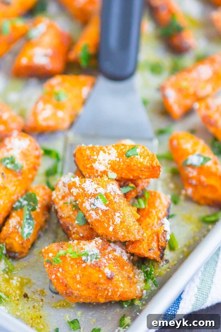 Savory Roasted Garlic Parmesan Carrots, an easy and flavorful side dish for any meal.