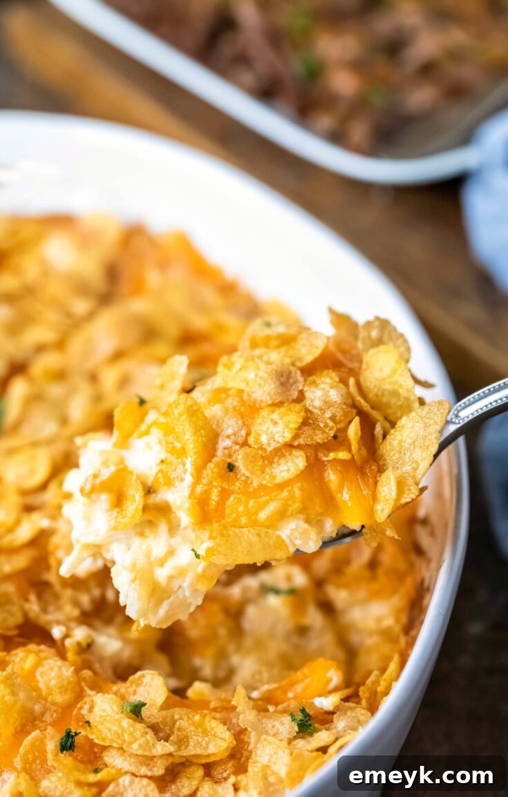 Easy and cheesy Funeral Potatoes, a great make-ahead potato casserole.