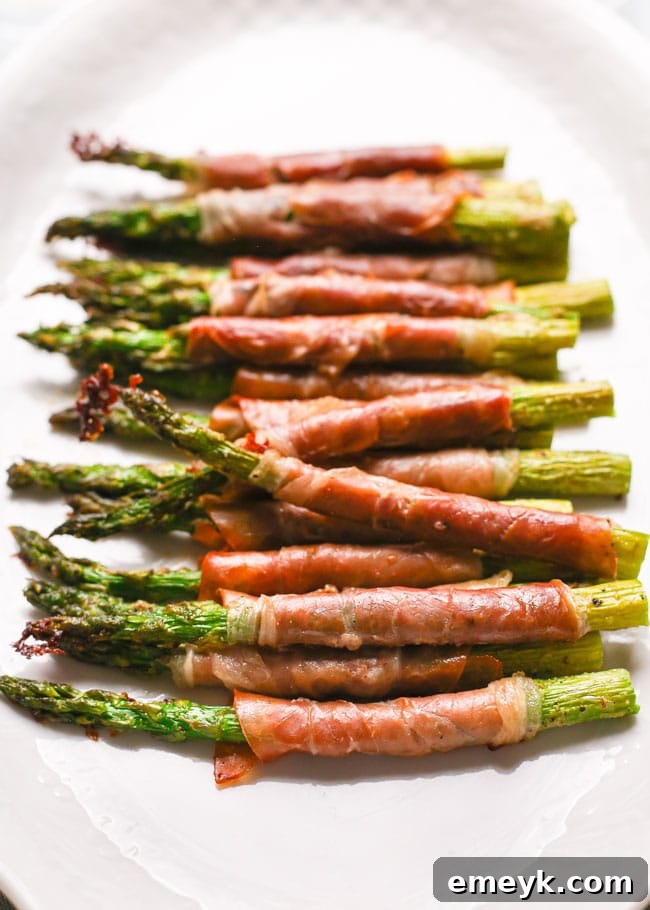 Elegant Prosciutto Wrapped Asparagus, a flavorful and appealing side or appetizer.