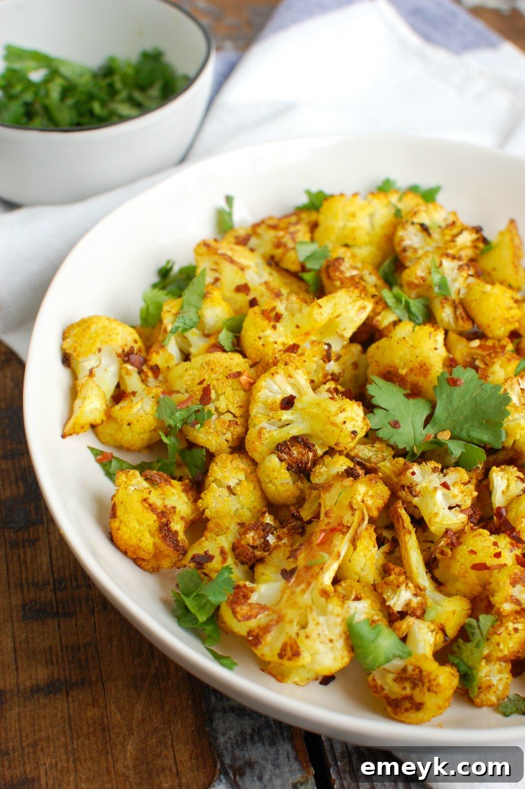Golden Turmeric Roasted Cauliflower, seasoned with warm, rich spices.