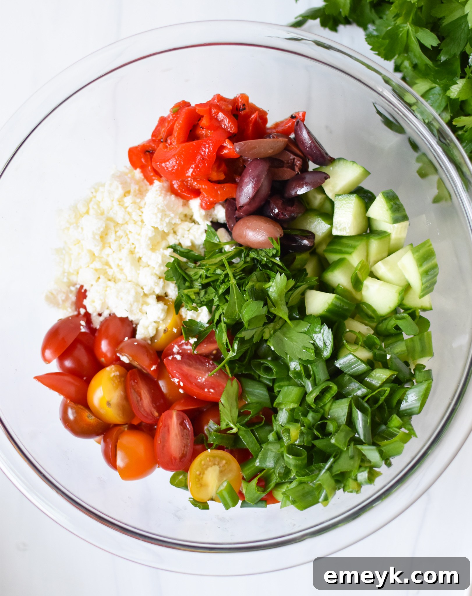 Sun-Drenched Mediterranean Salmon Bowl 6 Assembled Mediterranean Salmon Bowl ingredients, awaiting the addition of flaked salmon and zesty dressing.