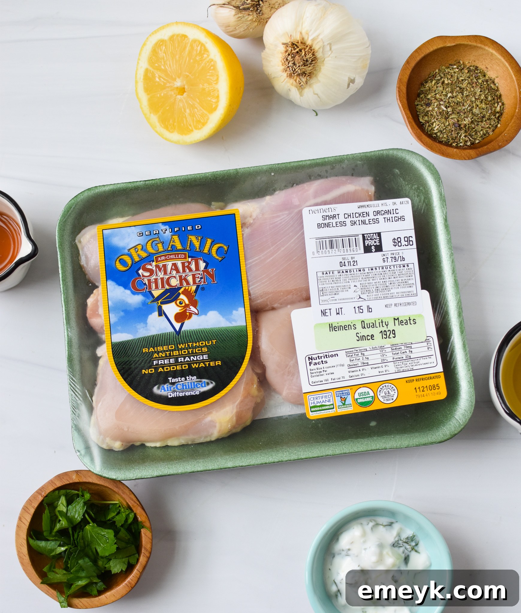 Flavorful Marinated Chicken Souvlaki 3 Chicken Souvlaki Recipe ingredients laid out on a wooden board.