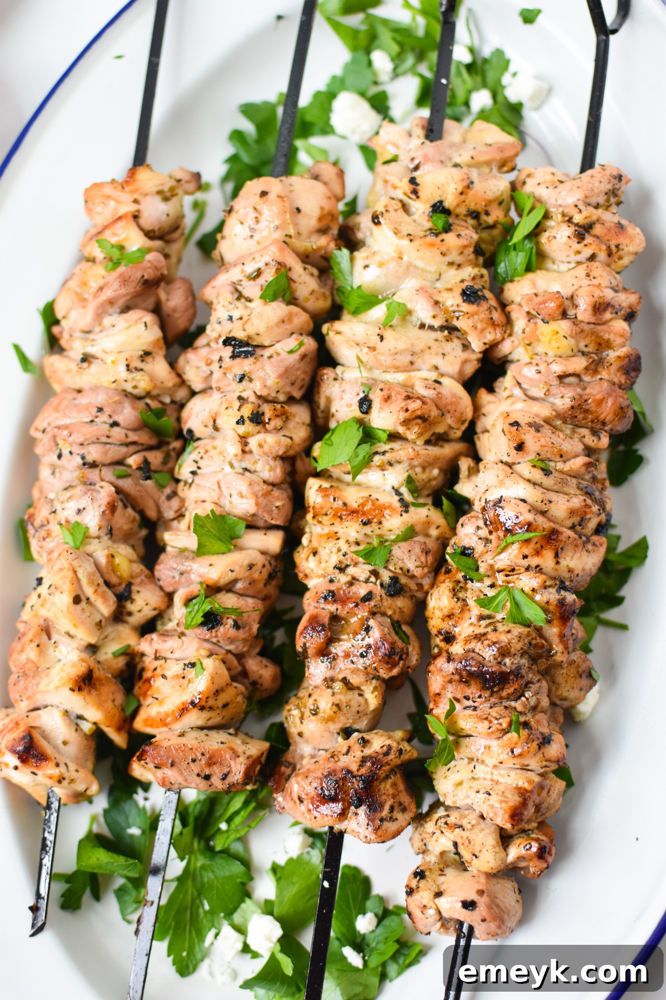 Flavorful Marinated Chicken Souvlaki 5 Chicken Souvlaki Recipe on skewers, ready for grilling.