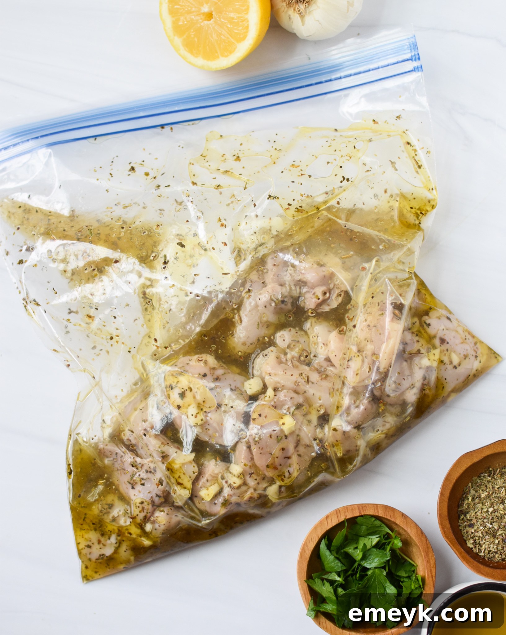 Flavorful Marinated Chicken Souvlaki 6 Chicken Souvlaki Recipe chicken marinating in a bag.