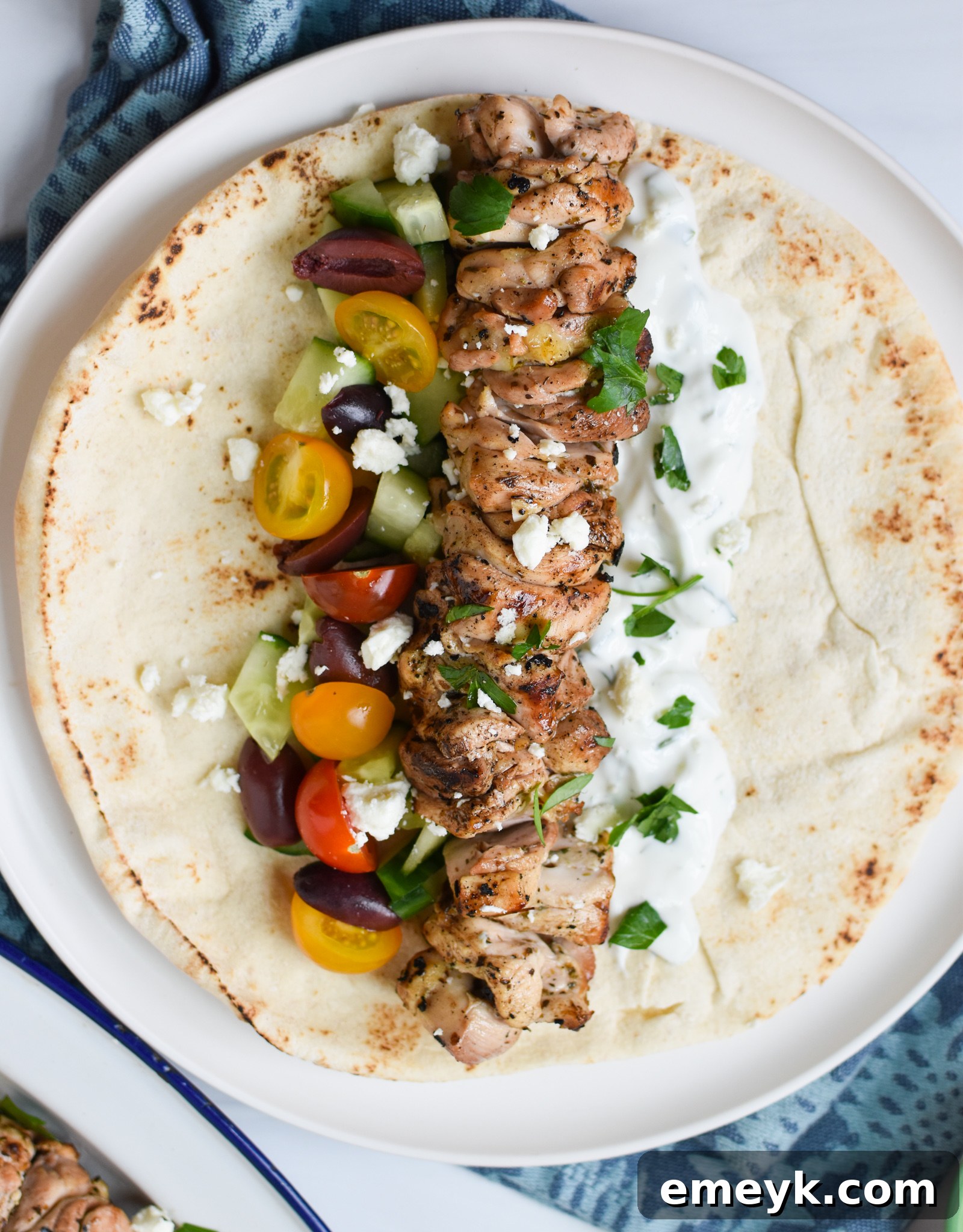Flavorful Marinated Chicken Souvlaki 8 Chicken Souvlaki Recipe with tzatziki and Greek salad components.