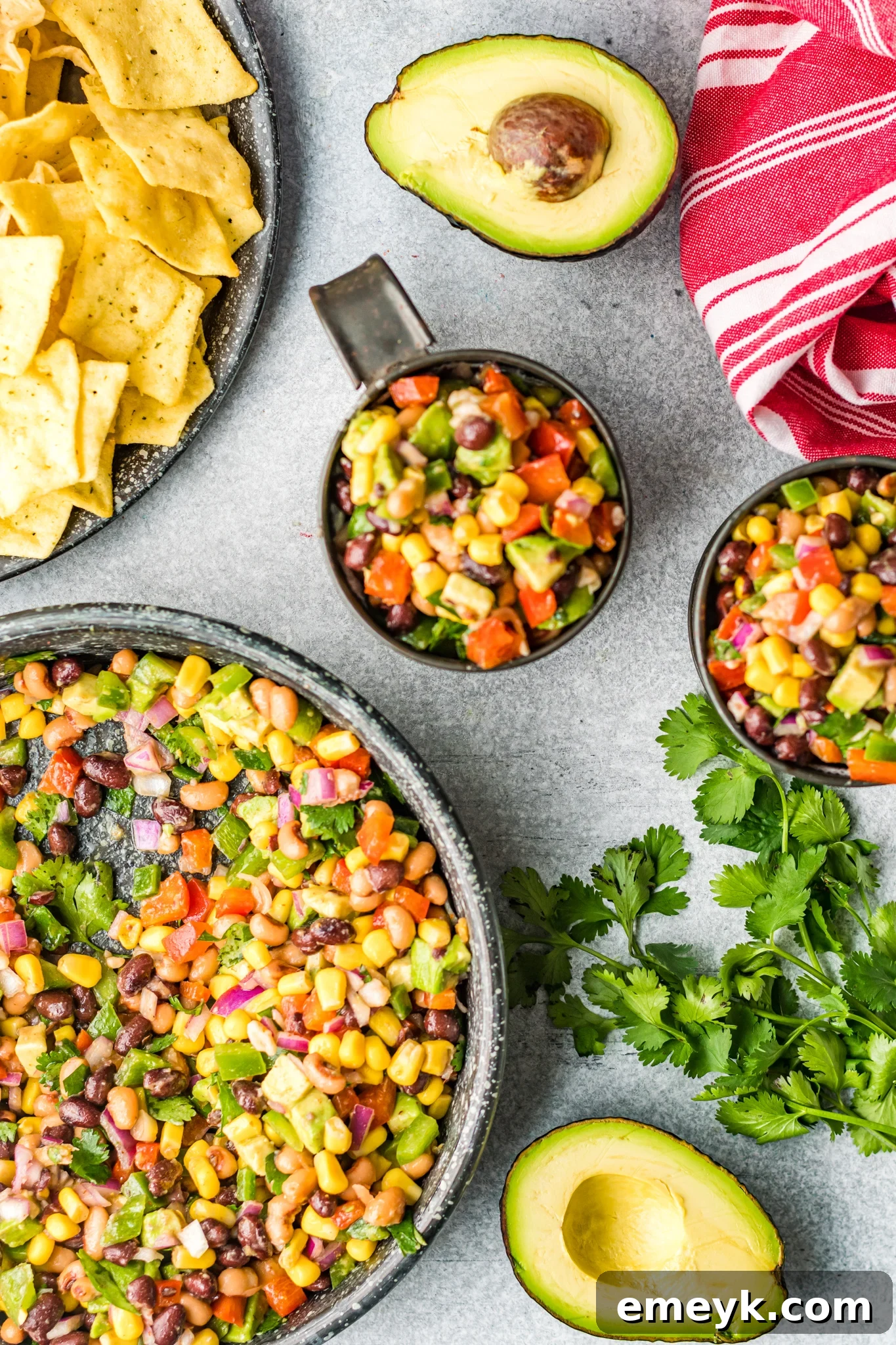 Zesty Cowboy Caviar Delight 2 Cowboy Caviar Recipe in a tin bowl, garnished with fresh cilantro.