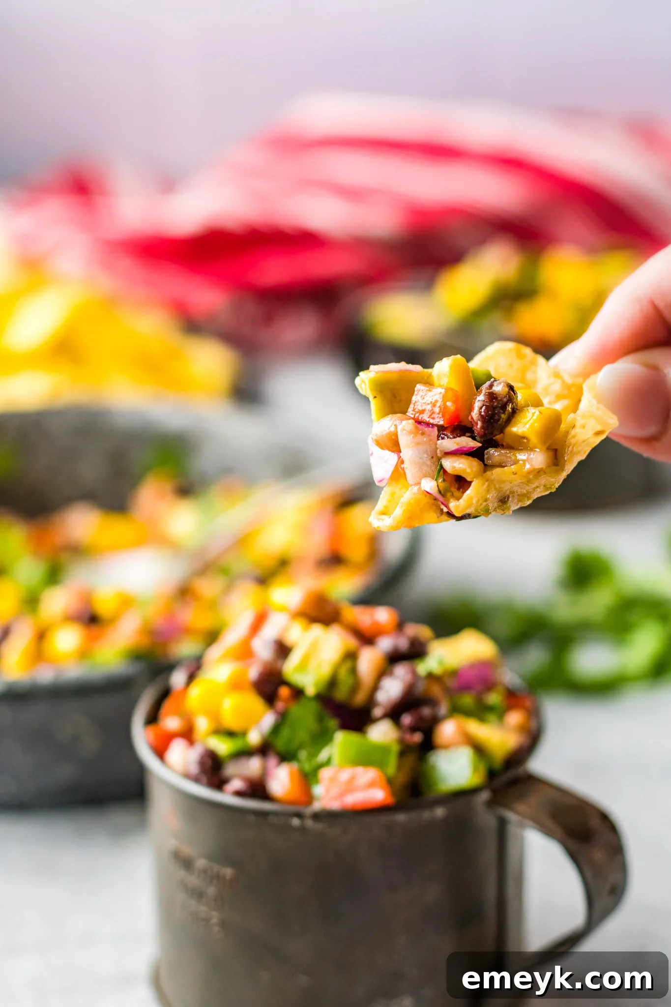 Zesty Cowboy Caviar Delight 4 Cowboy Caviar Recipe served with tortilla chips, ready for dipping.