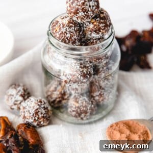Easy Date Protein Balls in a jar, ready to be enjoyed.