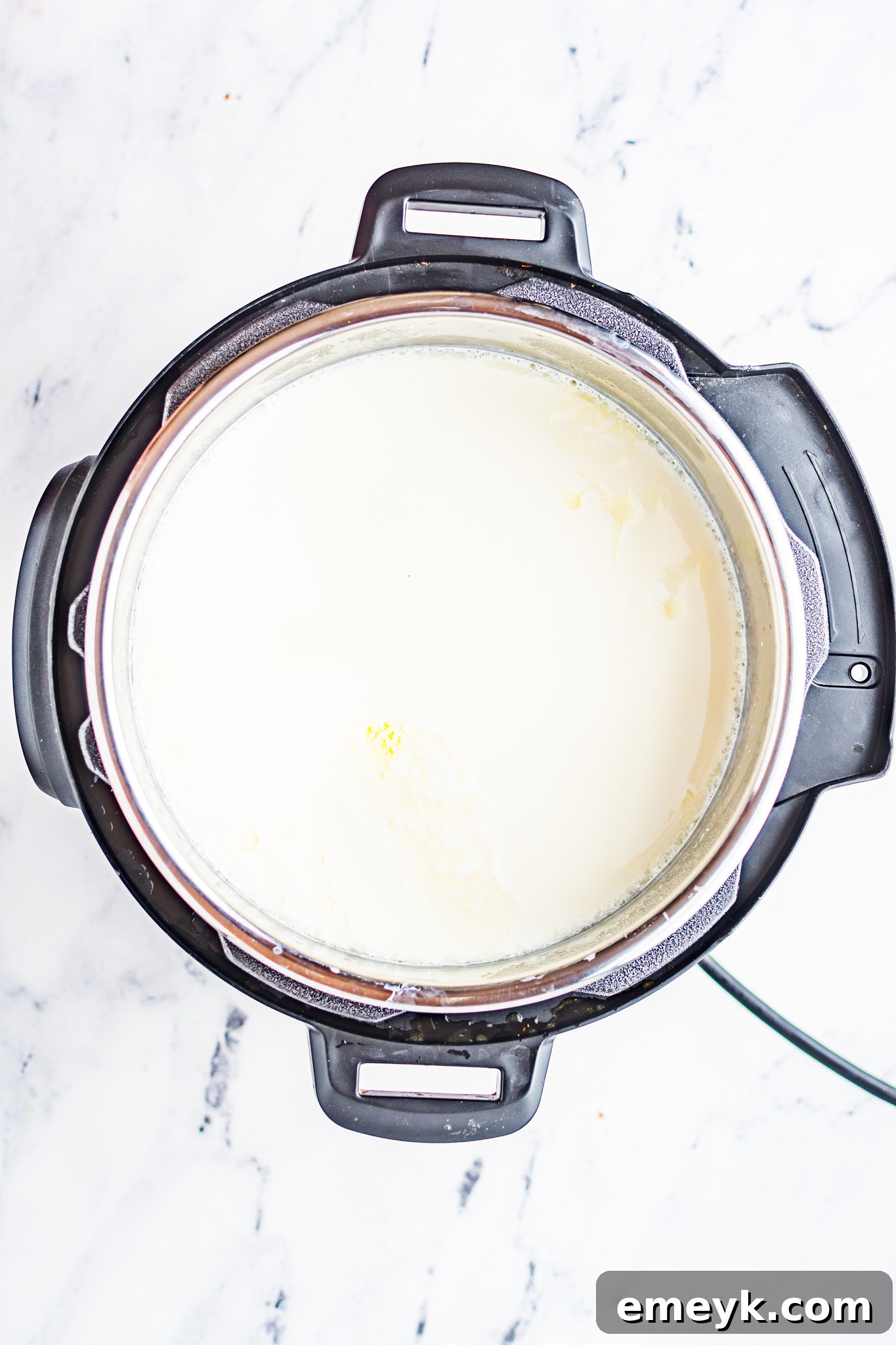 Instant Pot with the lid secured during the yogurt incubation process.