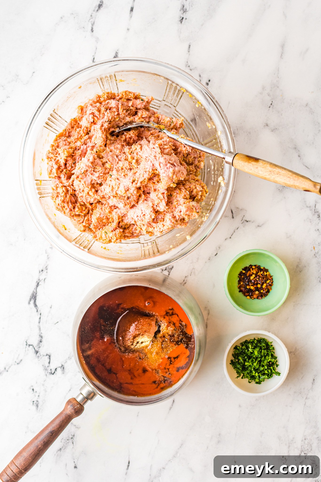 Cooked Air Fryer Meatballs in a serving dish, glistening with sauce.