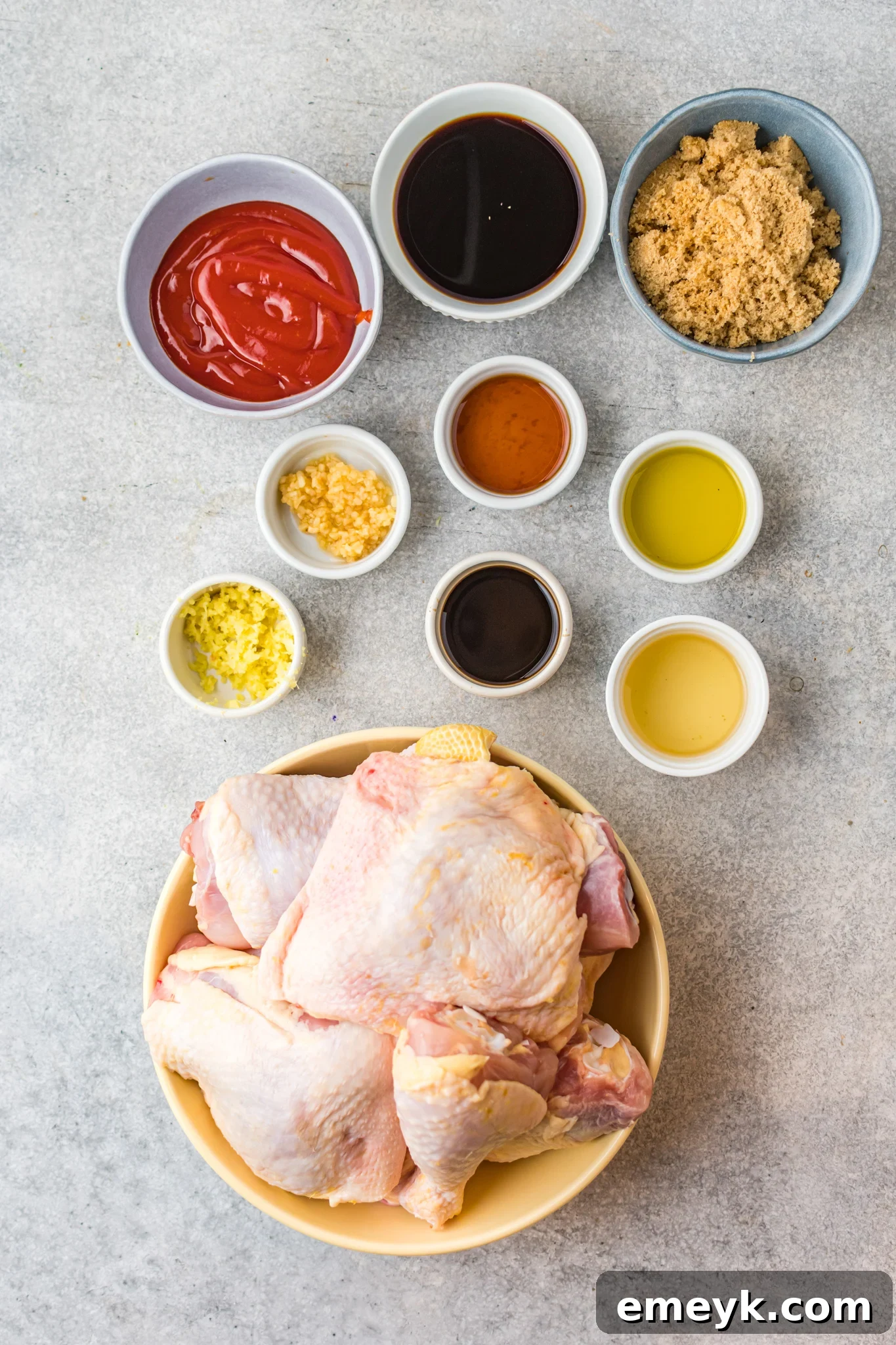 Golden Glazed Huli Huli Chicken 3 A collection of fresh ingredients for Huli Huli Chicken marinade, including ginger, garlic, soy sauce, and brown sugar.