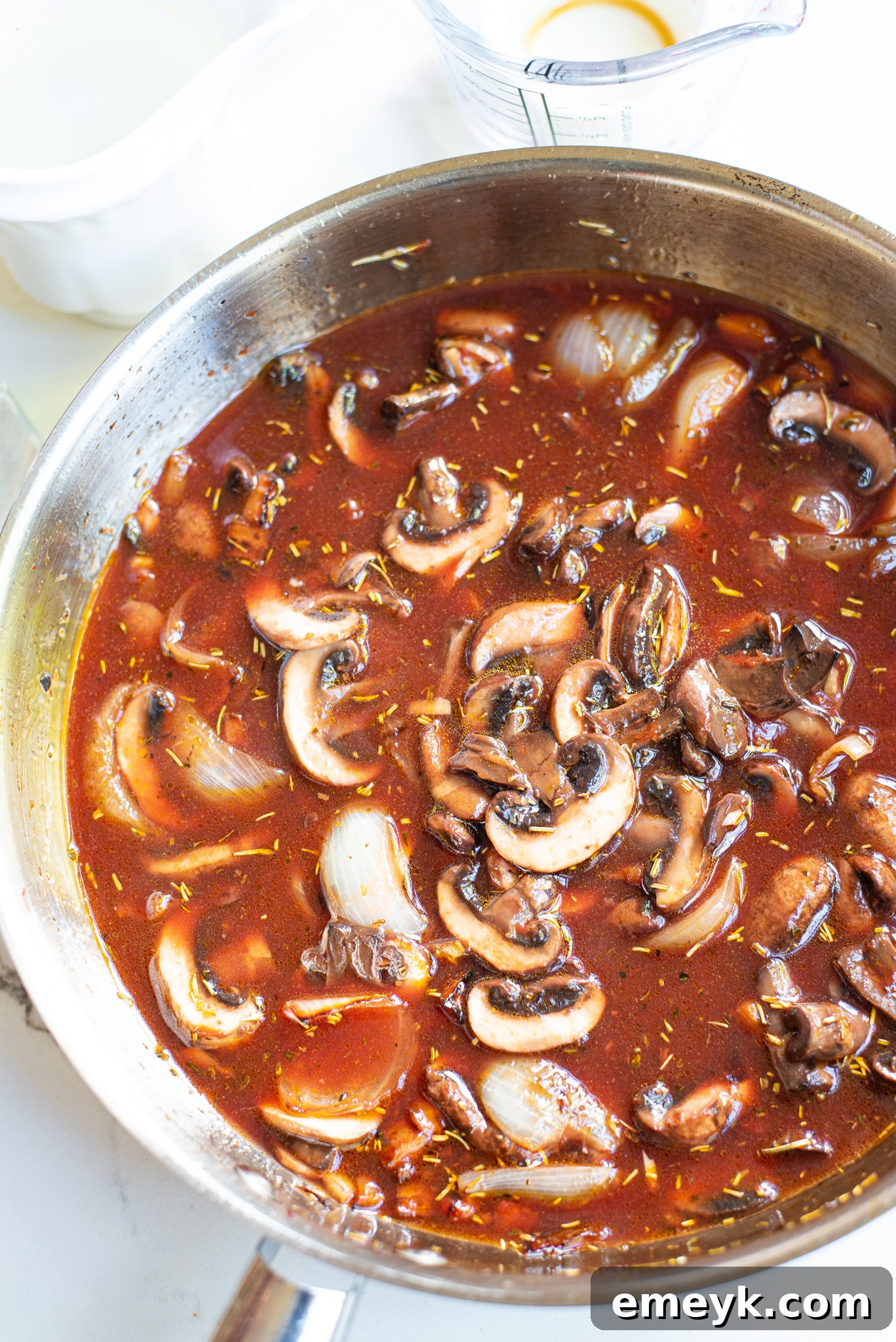 Close-up of tender mushrooms in the Bourguignon sauce.