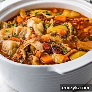 Unrolled Cabbage Soup 9 Cabbage Roll Soup in a rustic bowl with a spoon.