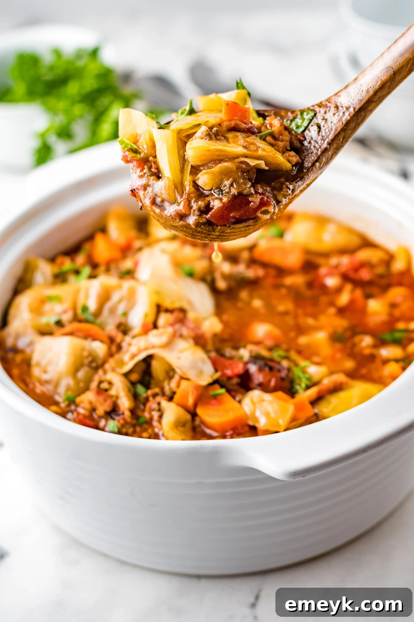 Unrolled Cabbage Soup 7 A large white pot filled with delicious Cabbage Roll Soup.