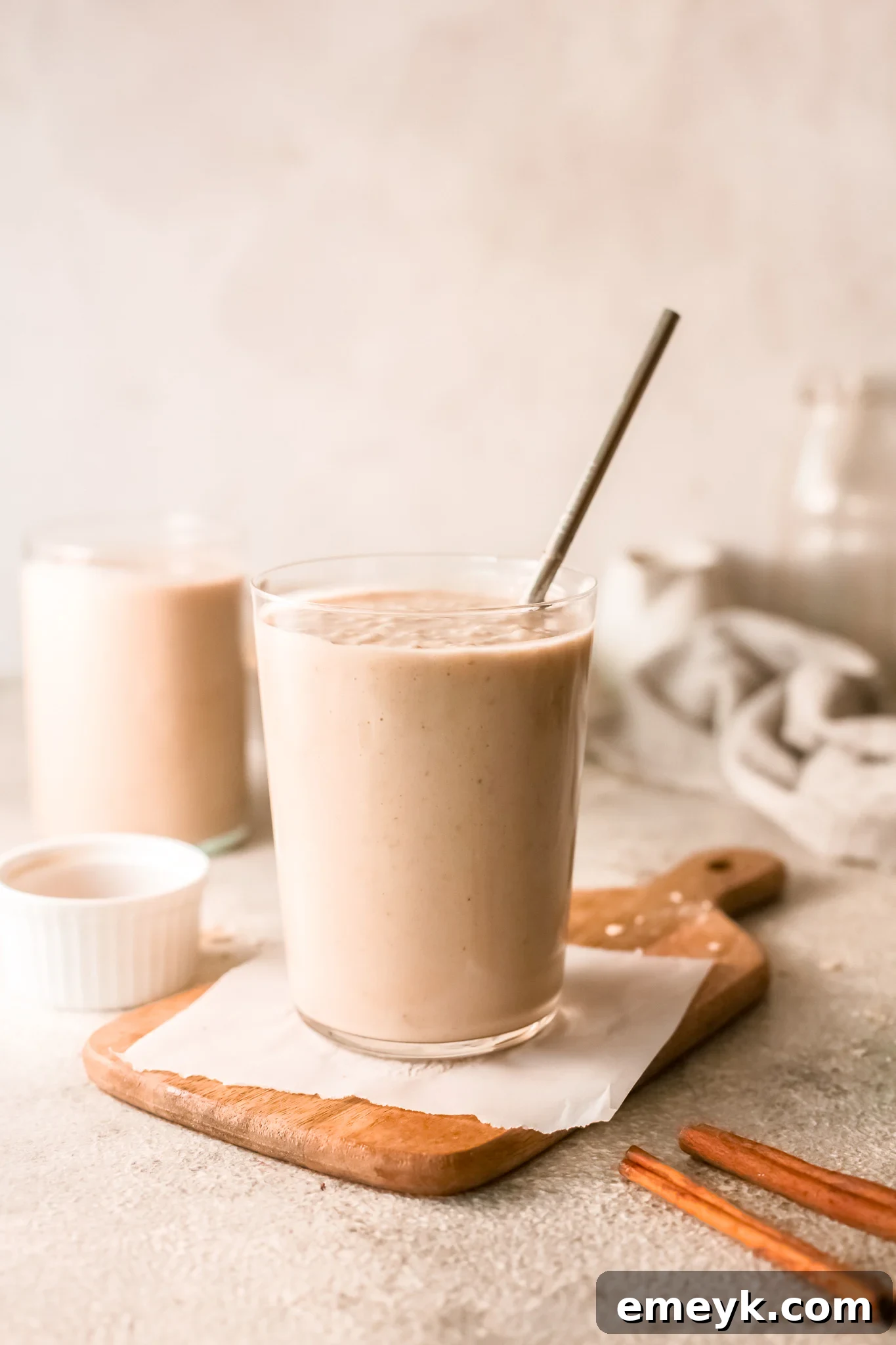 Creamy Oat Smoothie served in a glass cup, ready to drink.