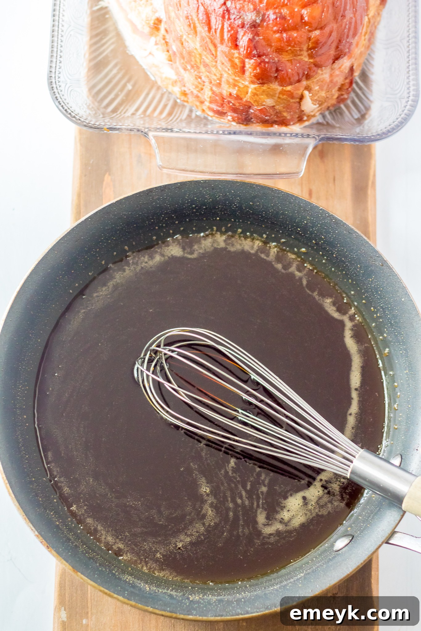 Apple Cider Glazed Ham Recipe sauce in a small bowl.