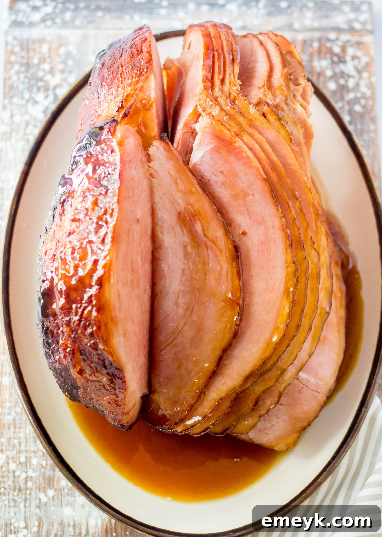 Apple Cider Glazed Ham Recipe in a serving dish, ready for the table.
