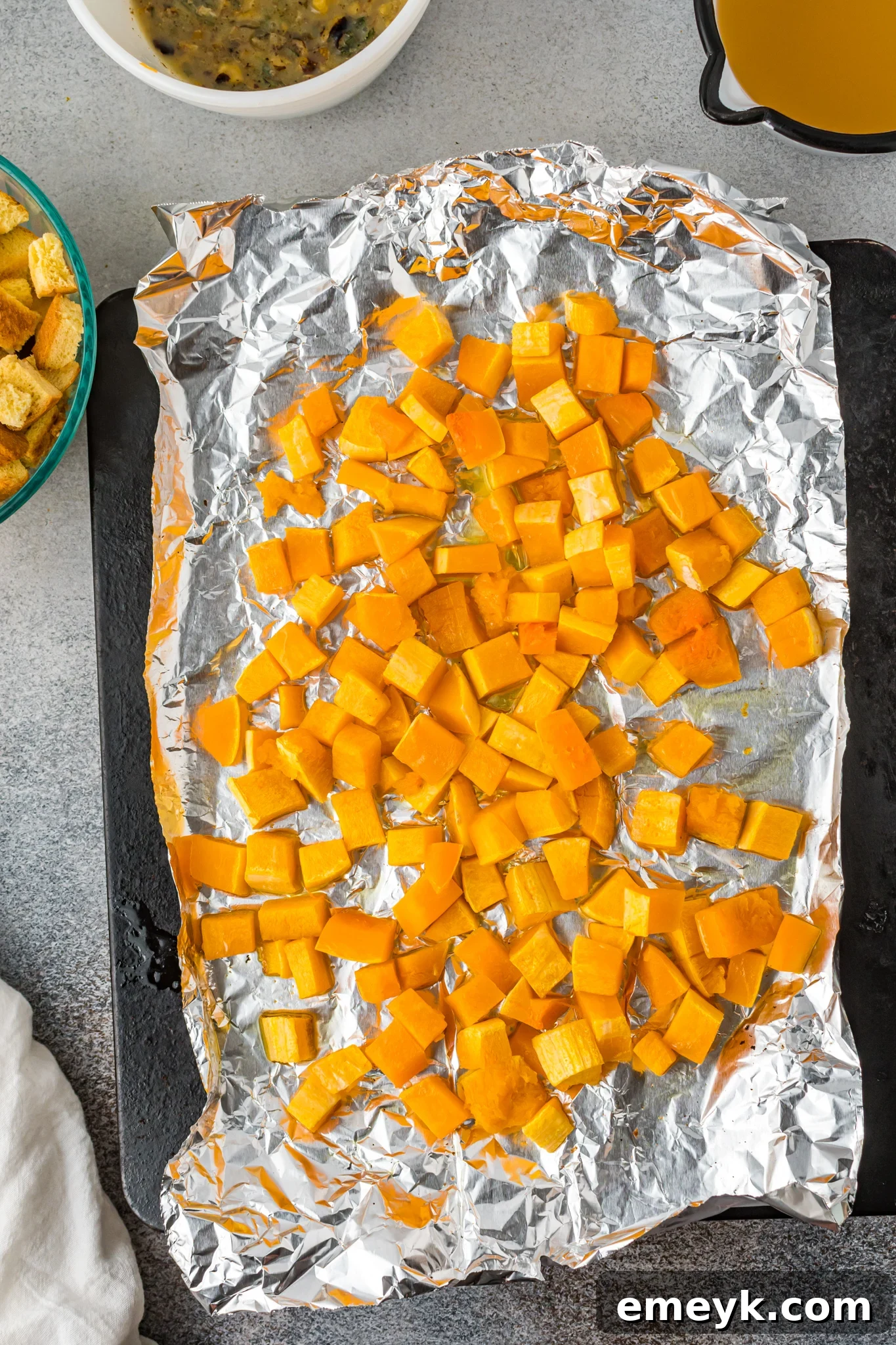 Harvest Butternut Squash Stuffing 5 Cubed butternut squash roasted on a baking sheet, tender and lightly caramelized.