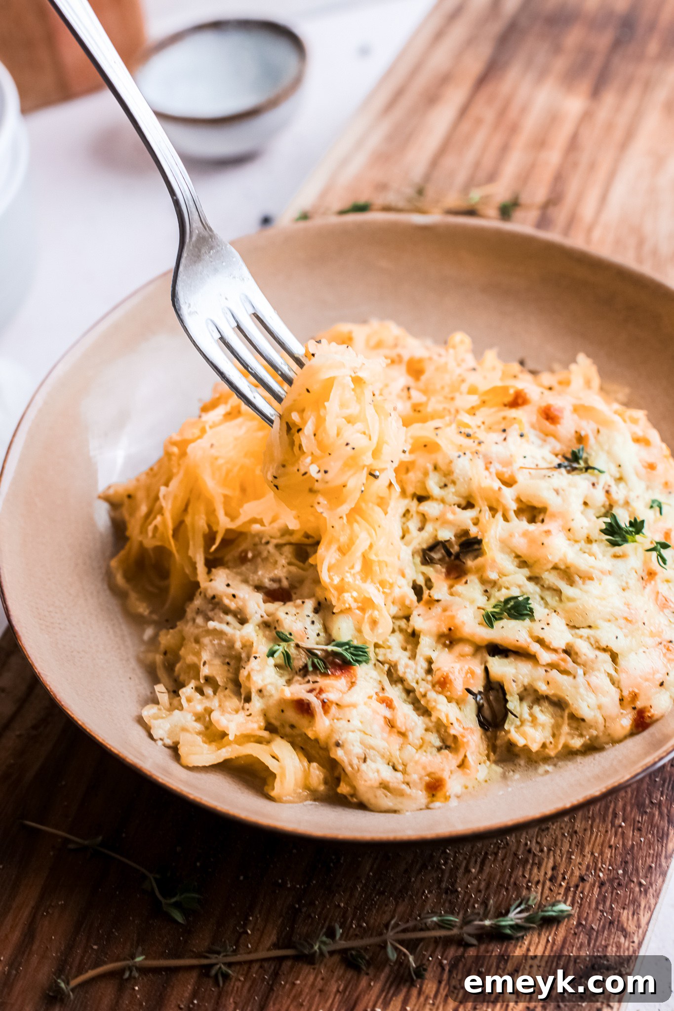 Baked Cheesy Spaghetti Squash Recipe with fork.