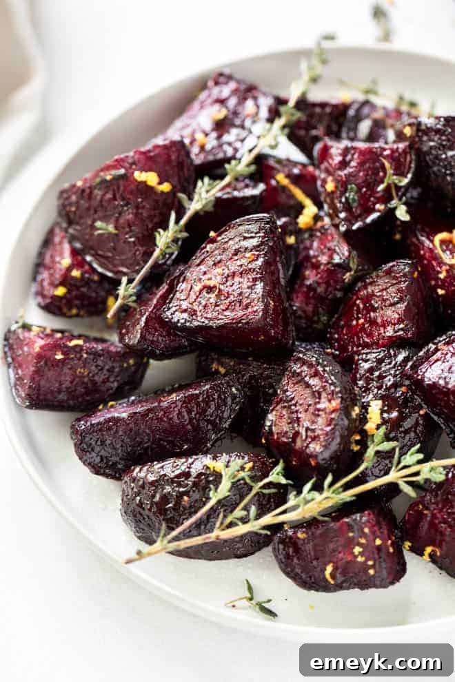 Vibrant Oven Roasted Beets, tender and earthy, often seasoned with herbs and olive oil.