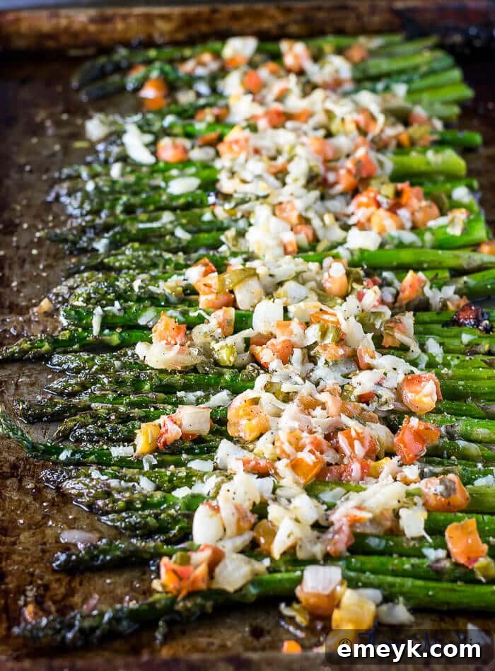 Crisp-tender Asiago Bruschetta Roasted Asparagus, topped with savory cheese and Italian-inspired flavors.