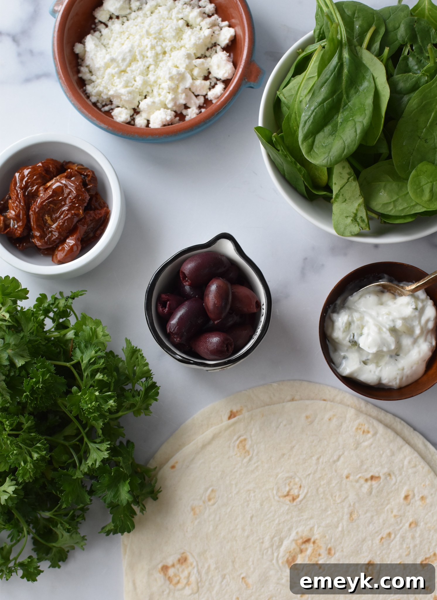 Simple Veggie Quesadillas 3 Fresh ingredients for Easy Vegetarian Quesadilla Recipe, including spinach, sun-dried tomatoes, and olives.