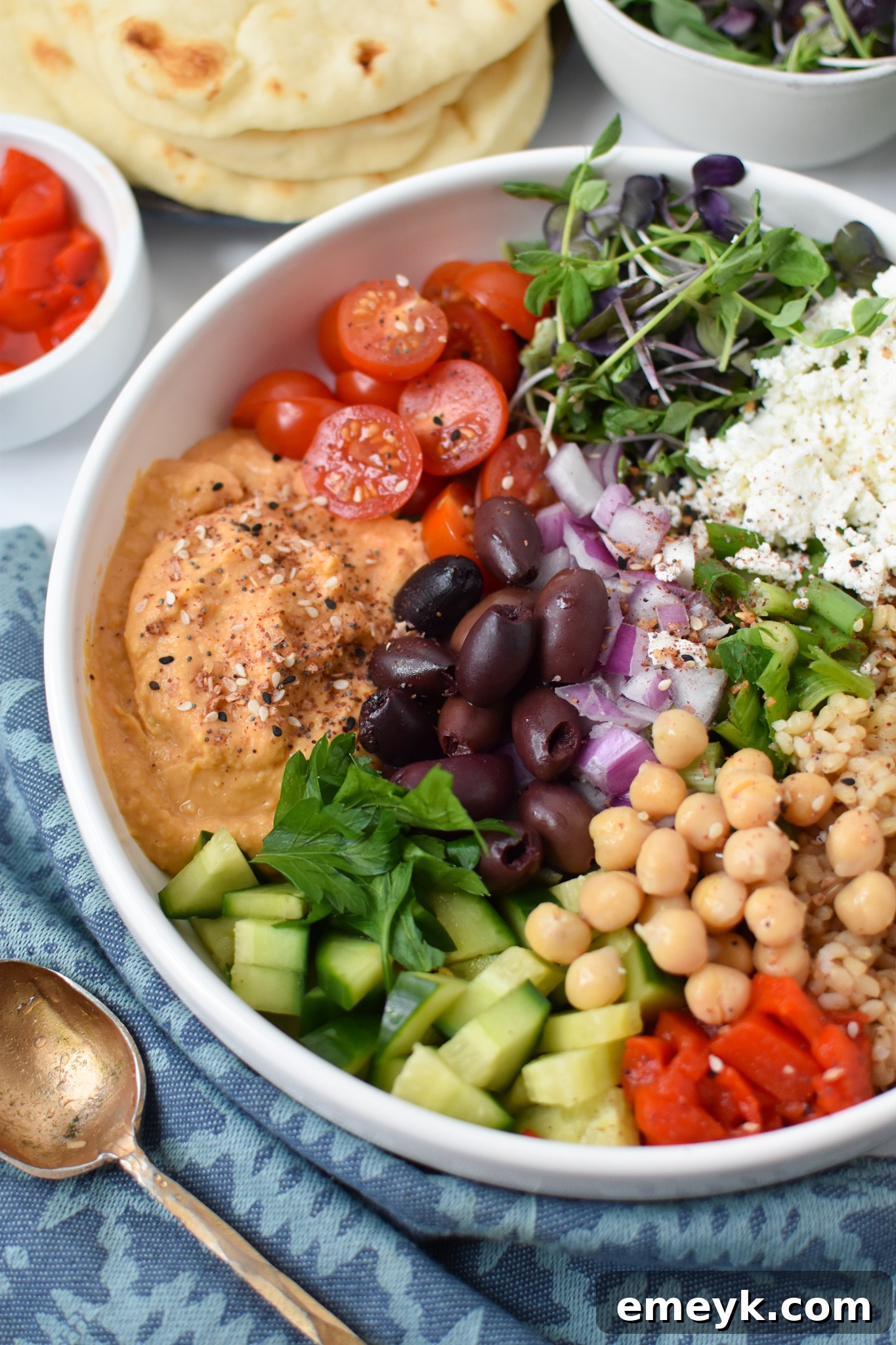 Vibrant Mediterranean Hummus Bowl 2 Easy Mediterranean Hummus Bowl in a white bowl.