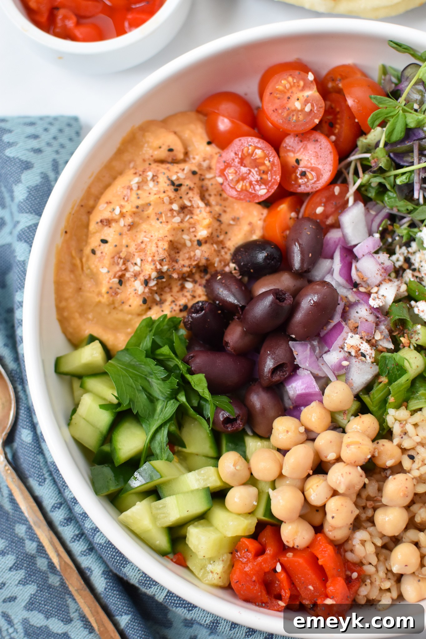 Vibrant Mediterranean Hummus Bowl 5 Easy Mediterranean Hummus Bowl with tomatoes.