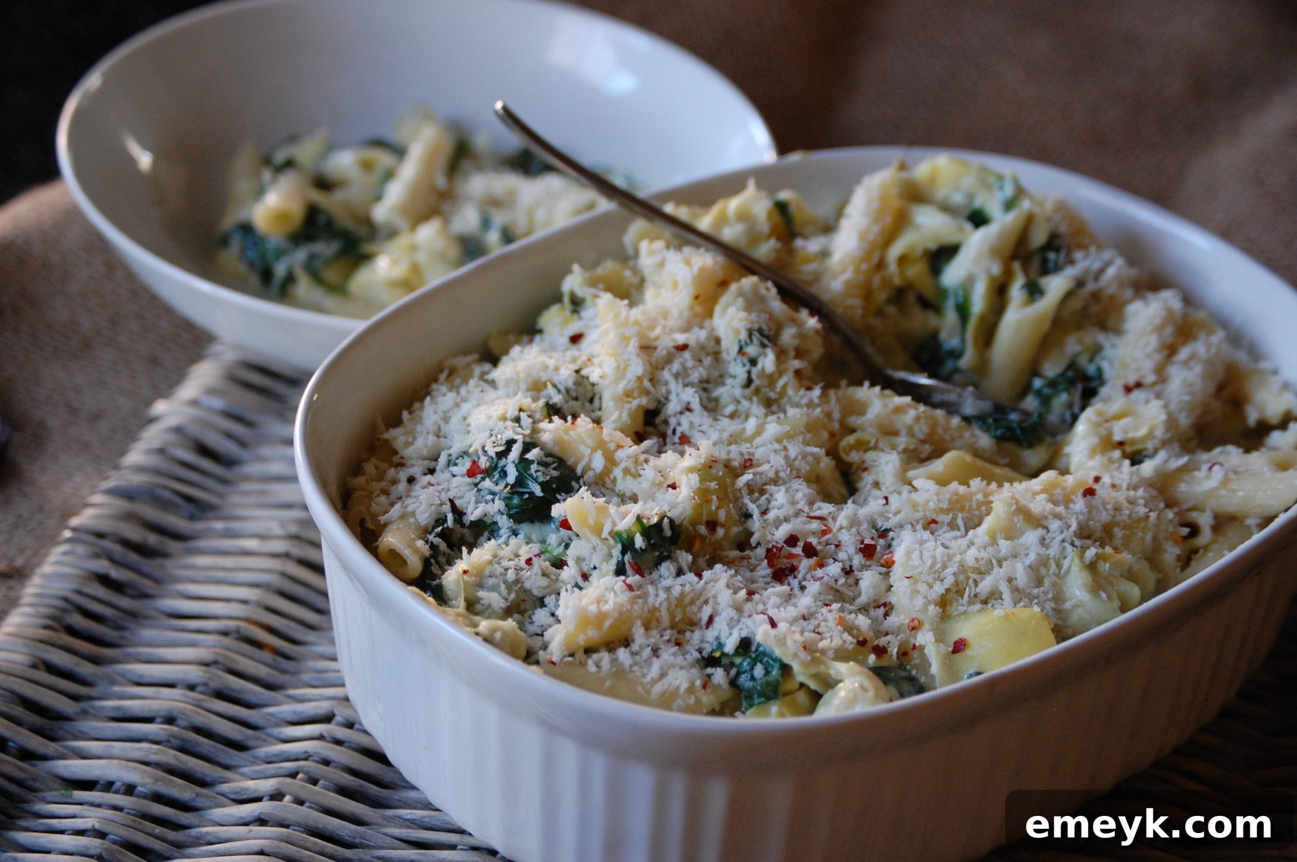 Creamy Spinach Artichoke Pasta with Panko Crunch 2 Creamy Spinach Artichoke Pasta with Panko Breadcrumbs on a rustic table