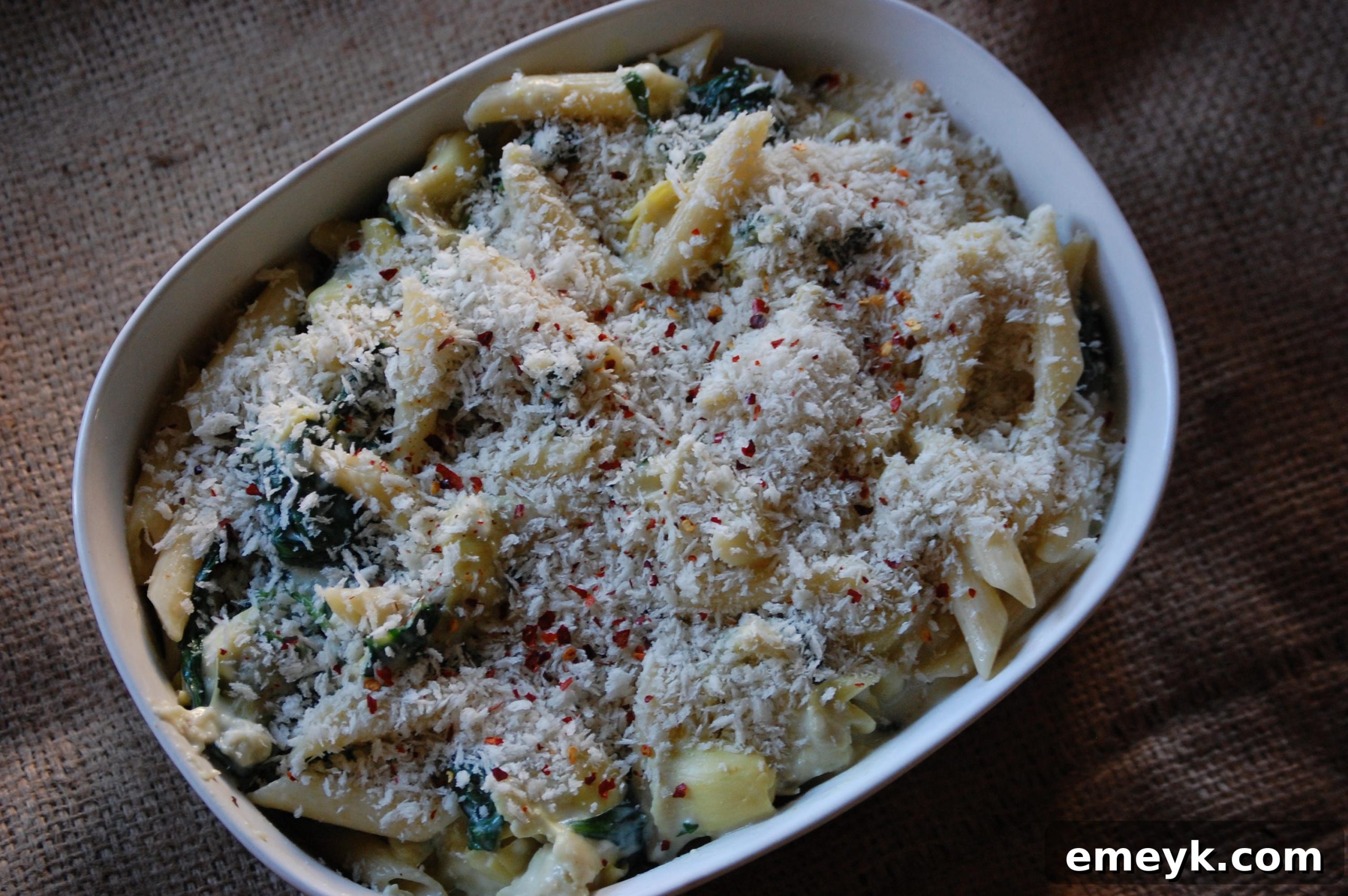 Creamy Spinach Artichoke Pasta with Panko Crunch 5 Ingredients for Spinach Artichoke Pasta on a cutting board