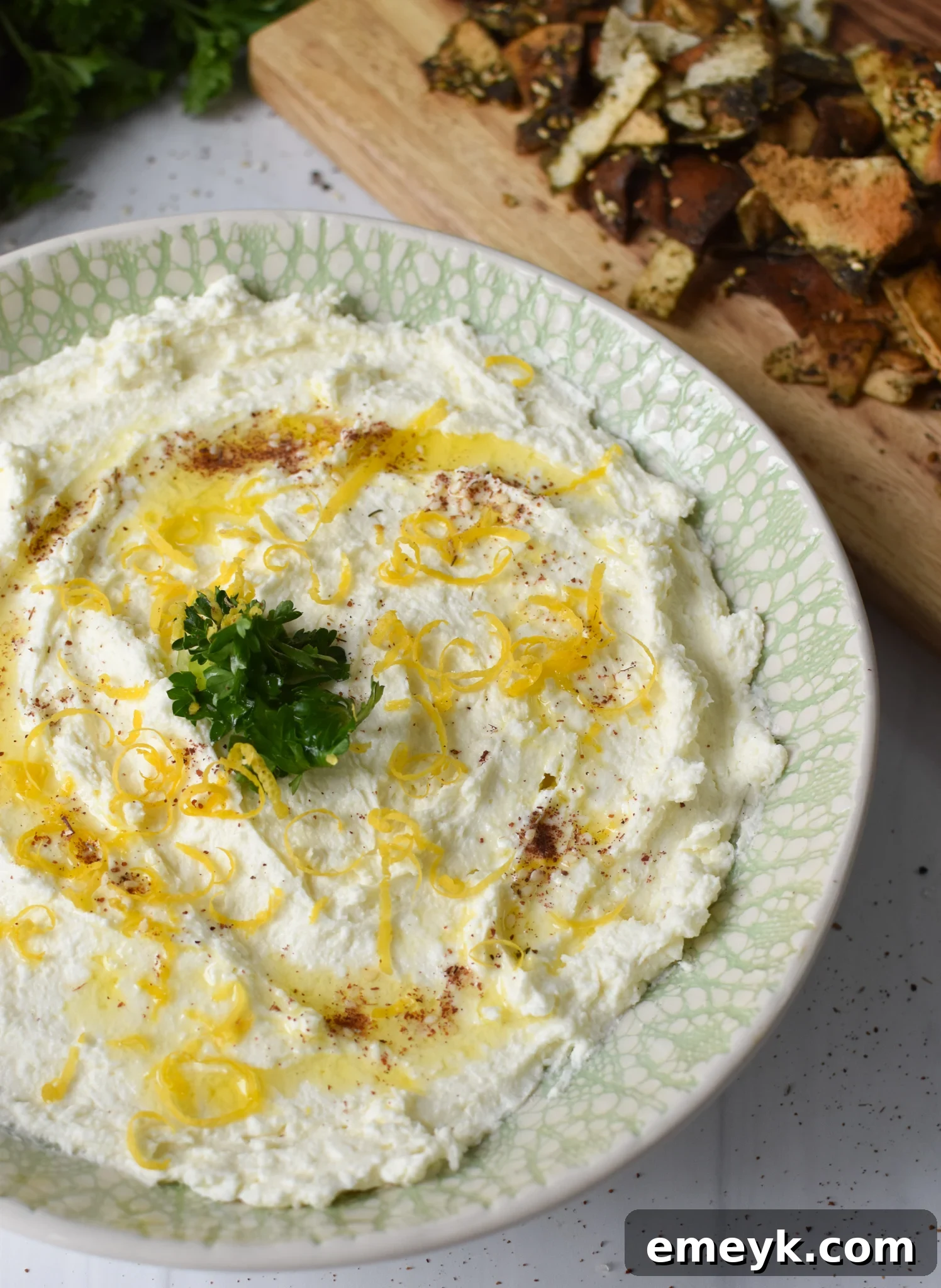 Lemon Whipped Feta Dip garnished with fresh parsley.