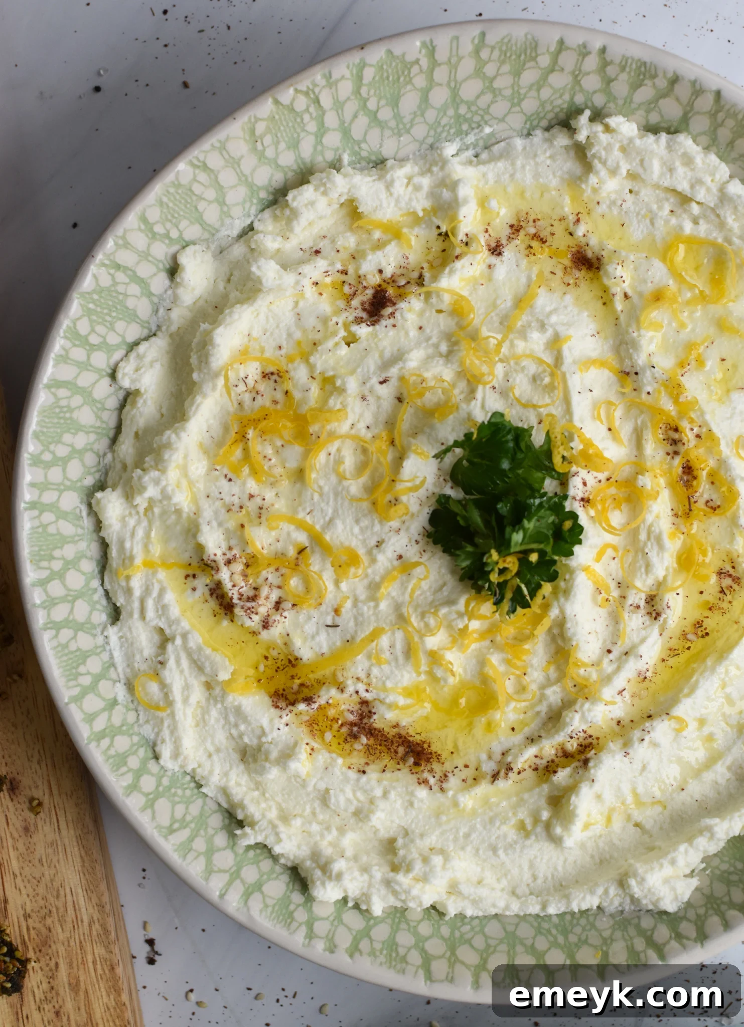 Lemon Whipped Feta Dip garnished with za'atar.