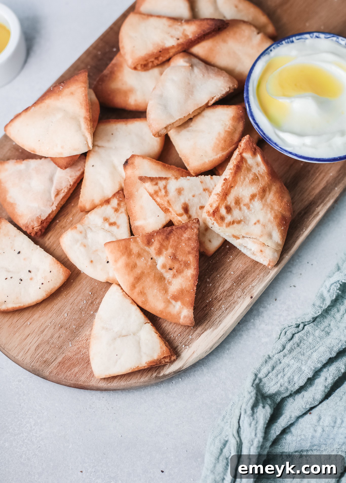 Air Fryer Pita Chips served with fresh tzatziki dip.