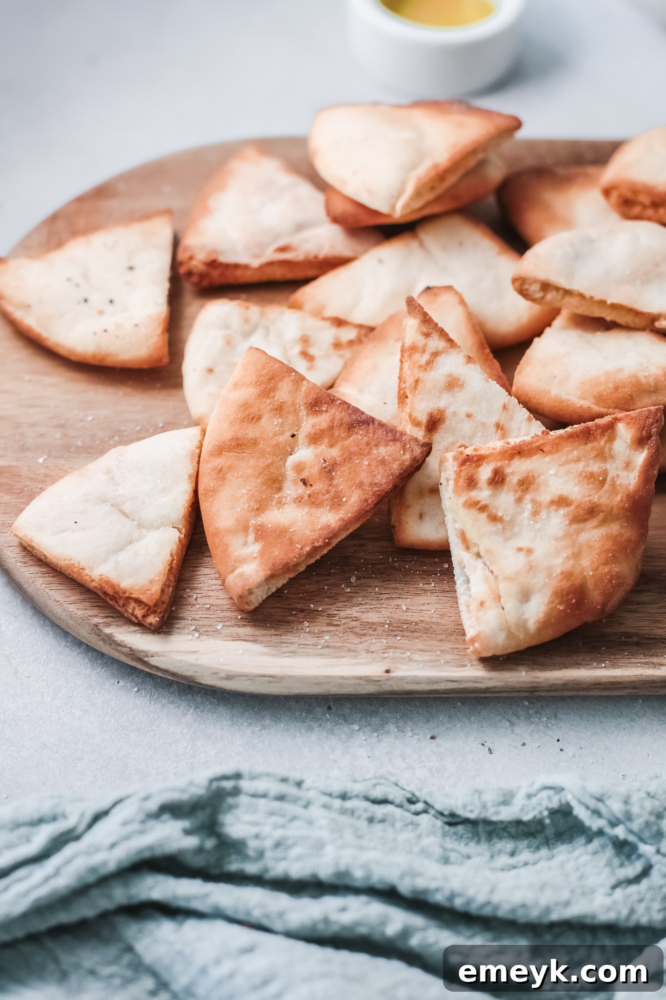 Air Fryer Pita Chips served with a blue napkin.