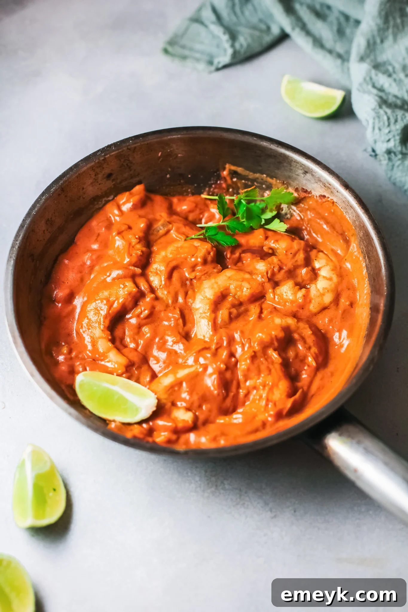 Weeknight Shrimp Curry 5 Shrimp searing in a skillet for Easy Shrimp Curry Recipe.