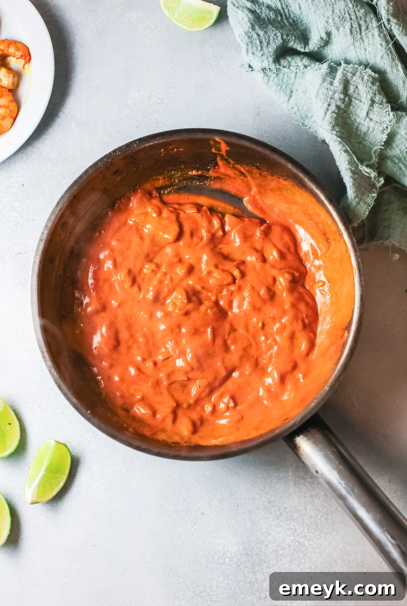Weeknight Shrimp Curry 8 Creamy curry sauce simmering in a skillet for Easy Shrimp Curry.