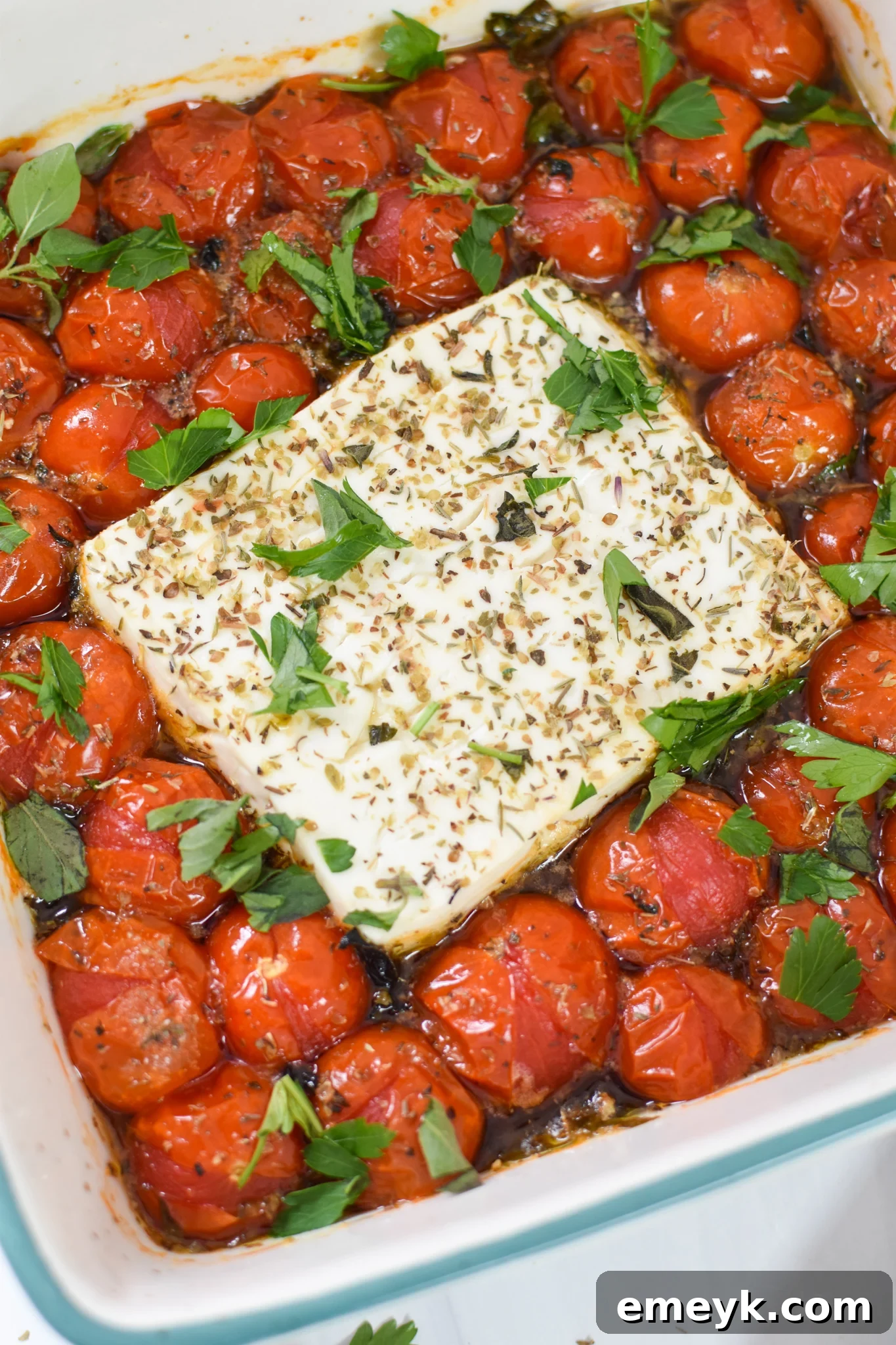 Effortless Baked Feta Delight 2 Easy Baked Feta Recipe with fresh herbs, ready to serve.